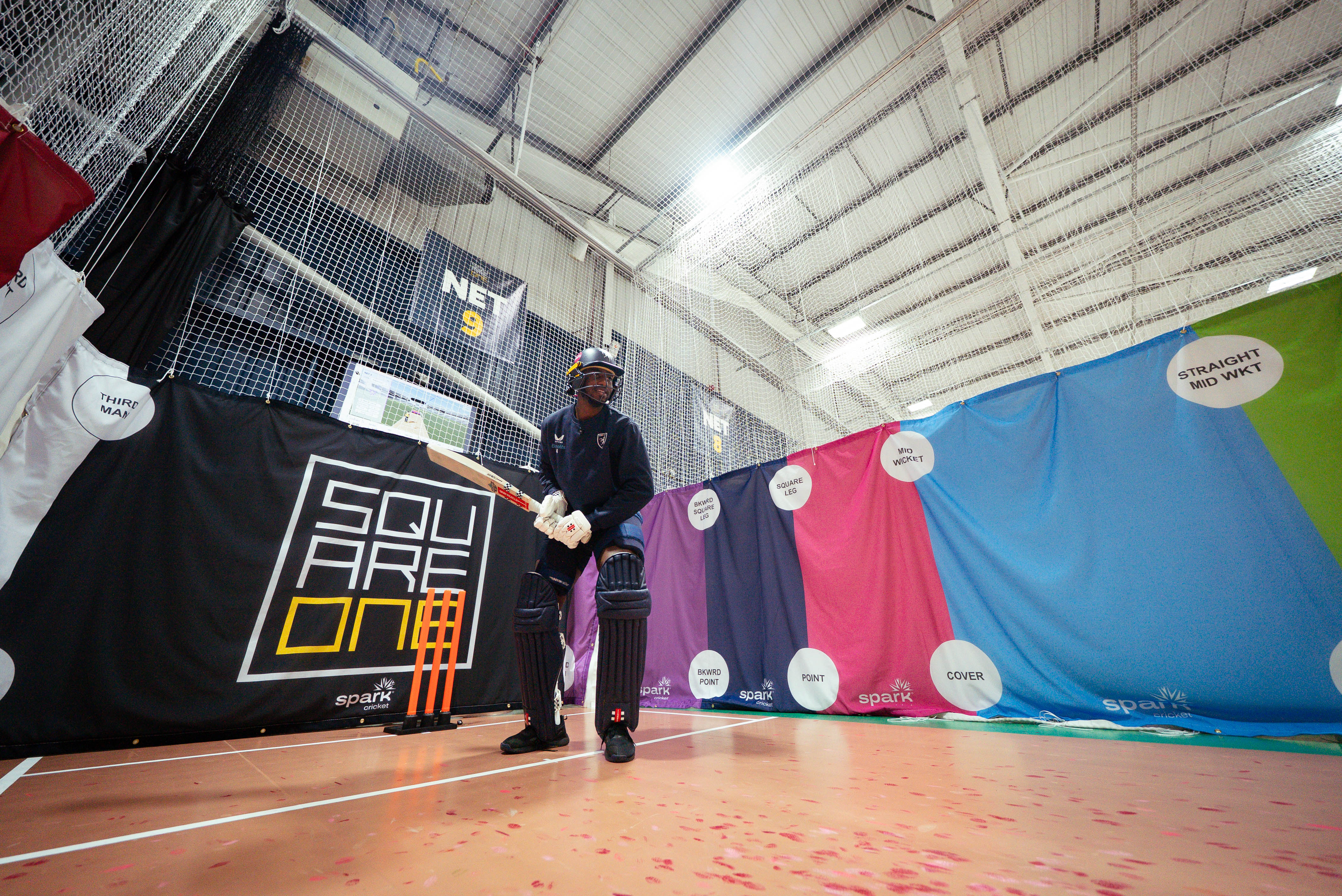 A player ready to face a ball in the SPARK net